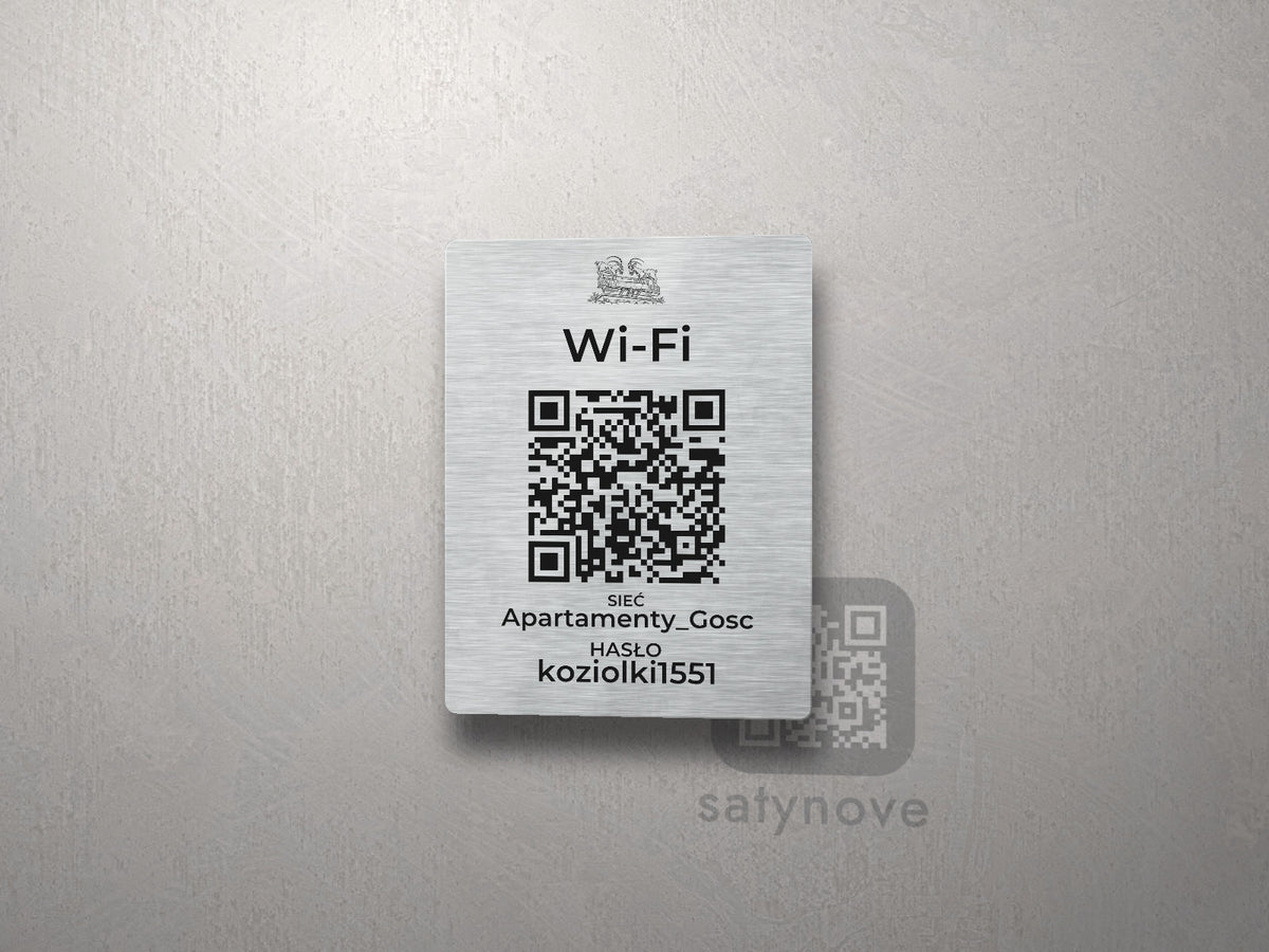 Srebrna tabliczka Wi-Fi z kodem QR i grafiką Poznania