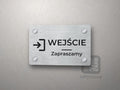 Tabliczka z piktogramem drzwi i napisem WEJŚCIE