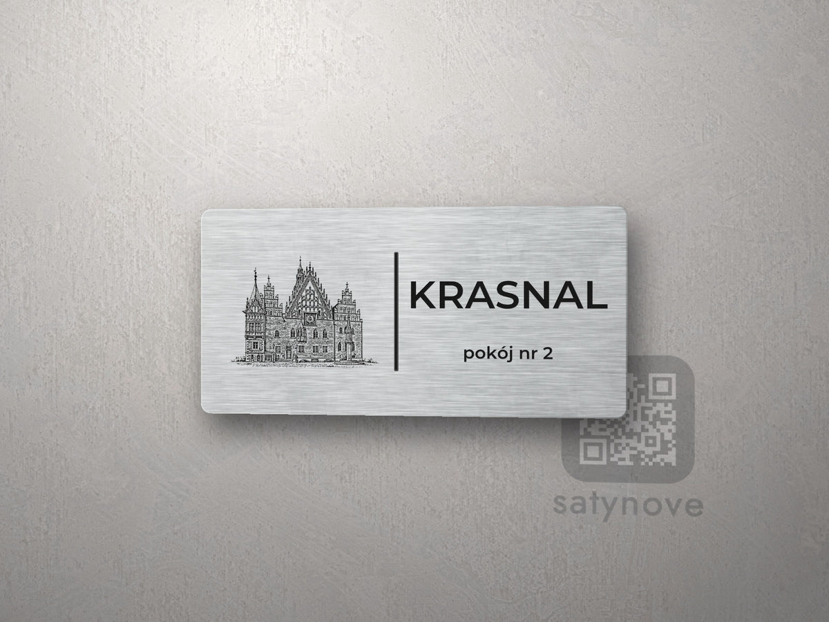 Srebrna tabliczka z rysunkiem i napisem KRASNAL, pokój nr 2