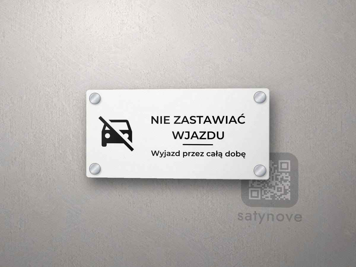 Tabliczka „Nie zastawiać wjazdu” z piktogramem