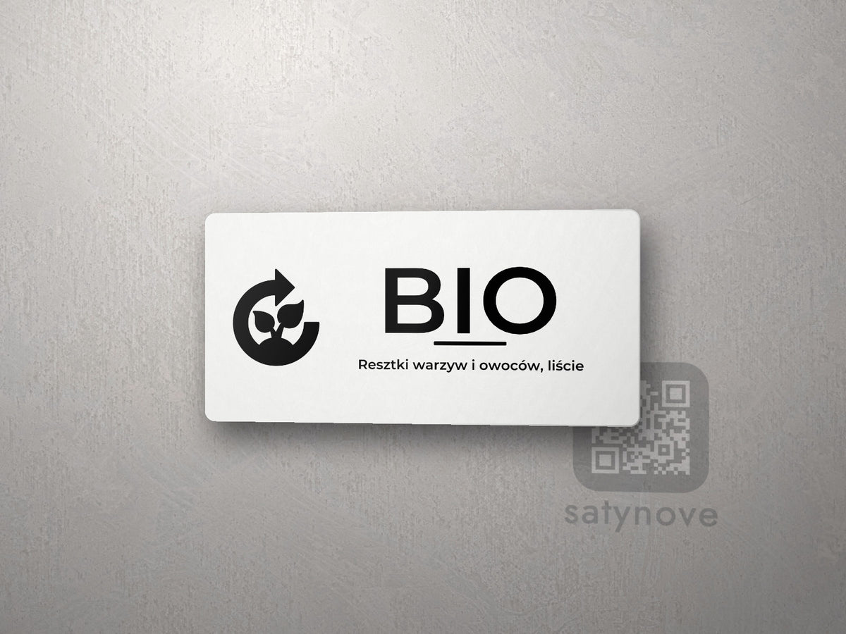 Biała tabliczka z napisem BIO i piktogramem kompostu