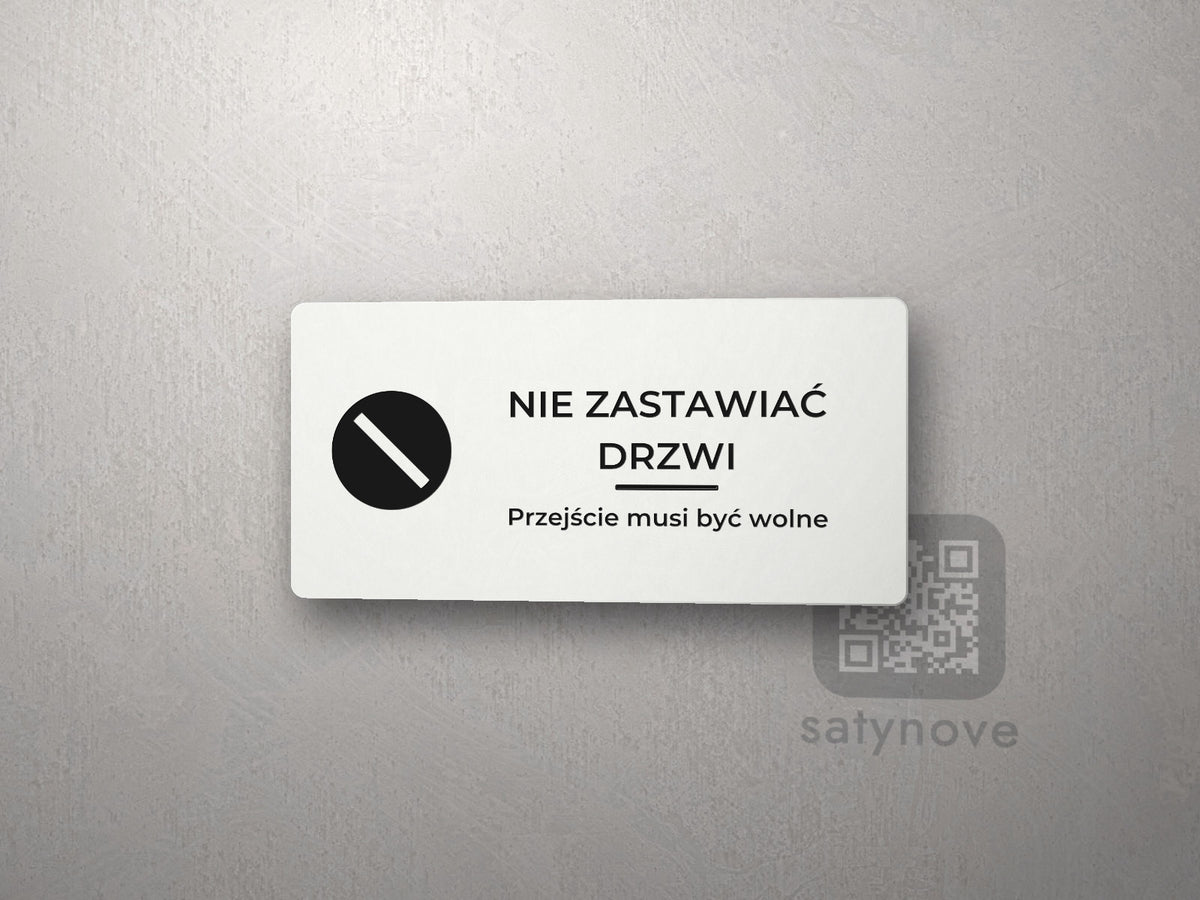 Tabliczka z piktogramem: NIE ZASTAWIAĆ DRZWI, Przejście musi być wolne
