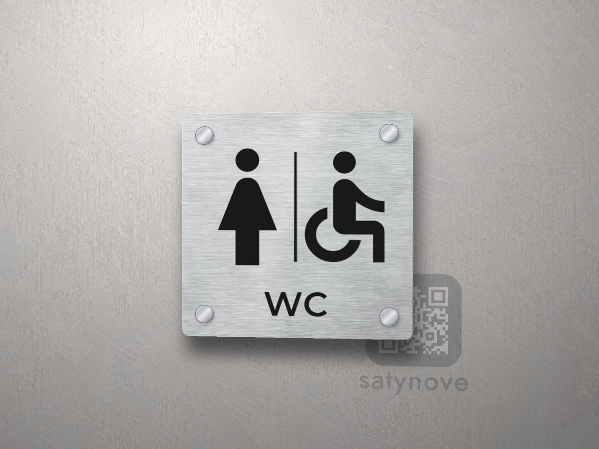 Tabliczka WC z sylwetką kobiety i symbolem osoby na wózku