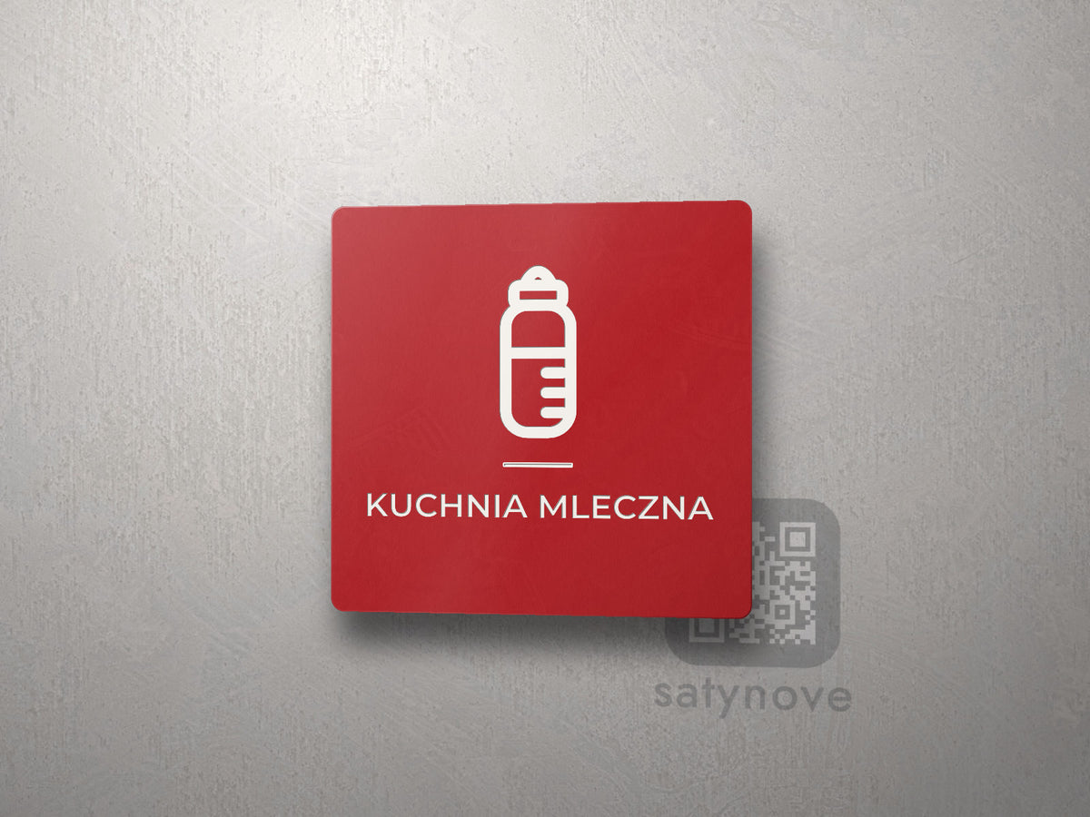 Czerwona kwadratowa tabliczka z obrazkiem i napisem KUCHNIA MLECZNA