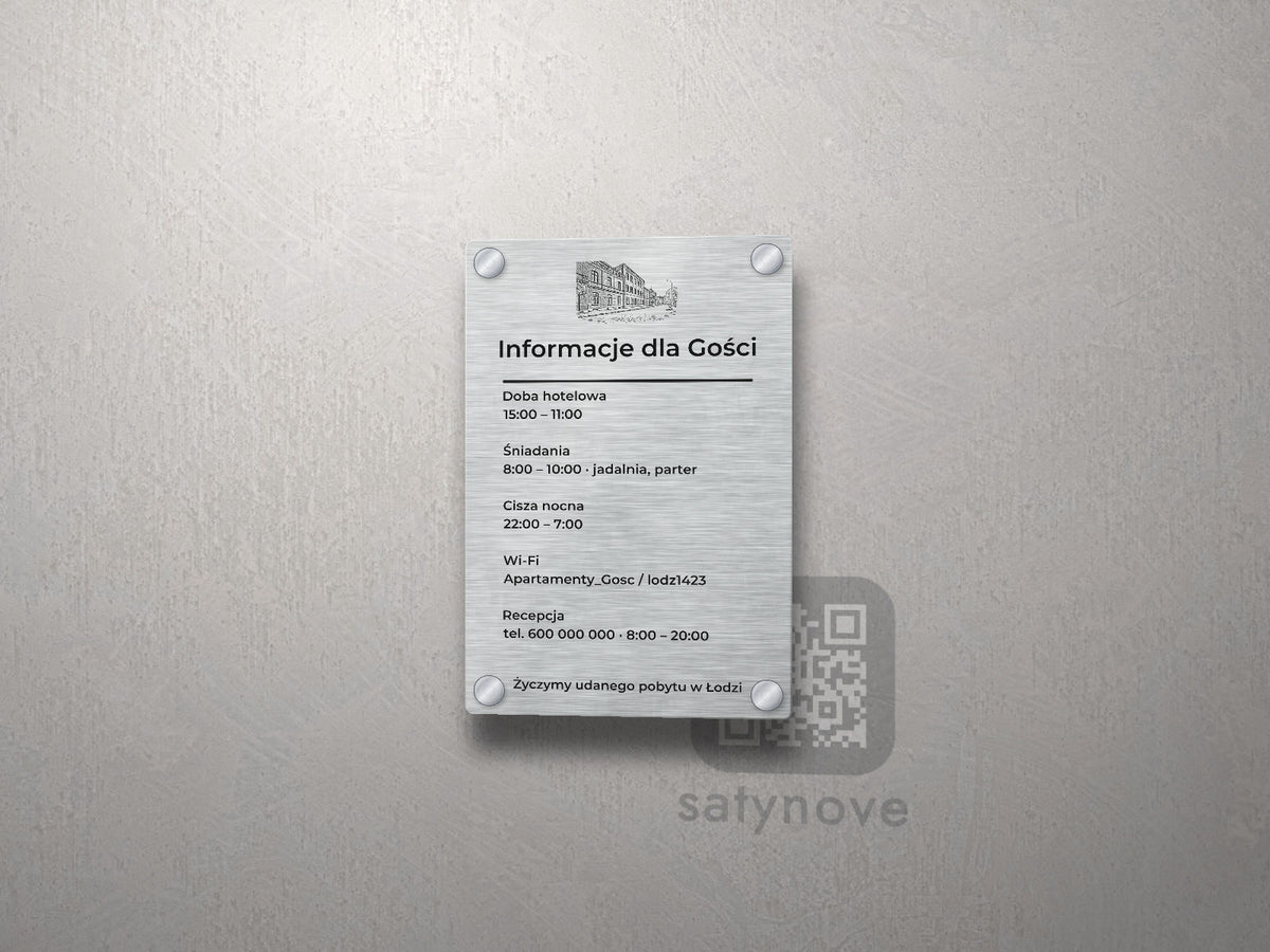 Srebrna tablica informacyjna dla gości z grafiką Łodzi