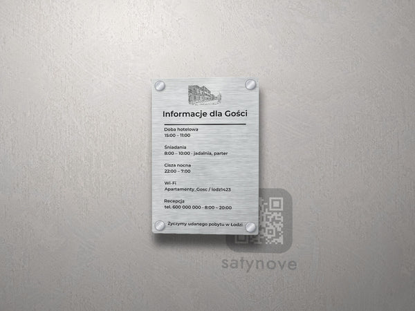 Srebrna tablica informacyjna dla gości z grafiką Łodzi