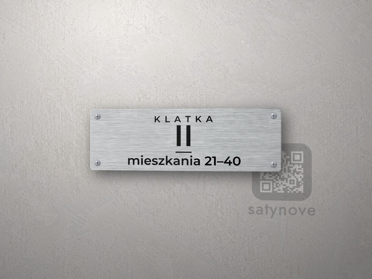 Tabliczka KLATKA II, pod linią „mieszkania 21–40”
