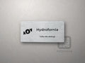 Srebrna tabliczka z piktogramem i napisem Hydrofornia