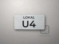 Numer lokalu – tabliczka