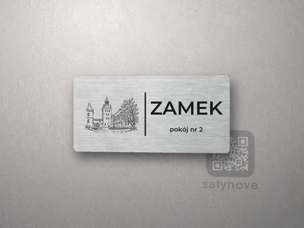 Srebrna tabliczka z rysunkiem i napisem ZAMEK, pokój nr 2