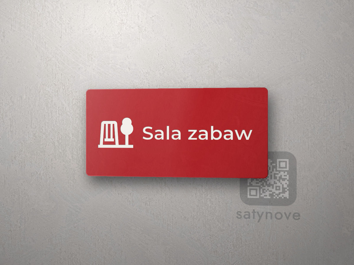 Czerwona tabliczka z piktogramem i napisem Sala zabaw