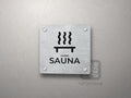 Piktogram Sauna – tabliczka z podpisem
