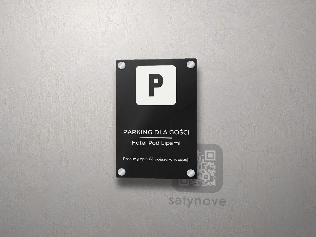 Pionowa czarna tabliczka z symbolem P i napisem Parking dla gości