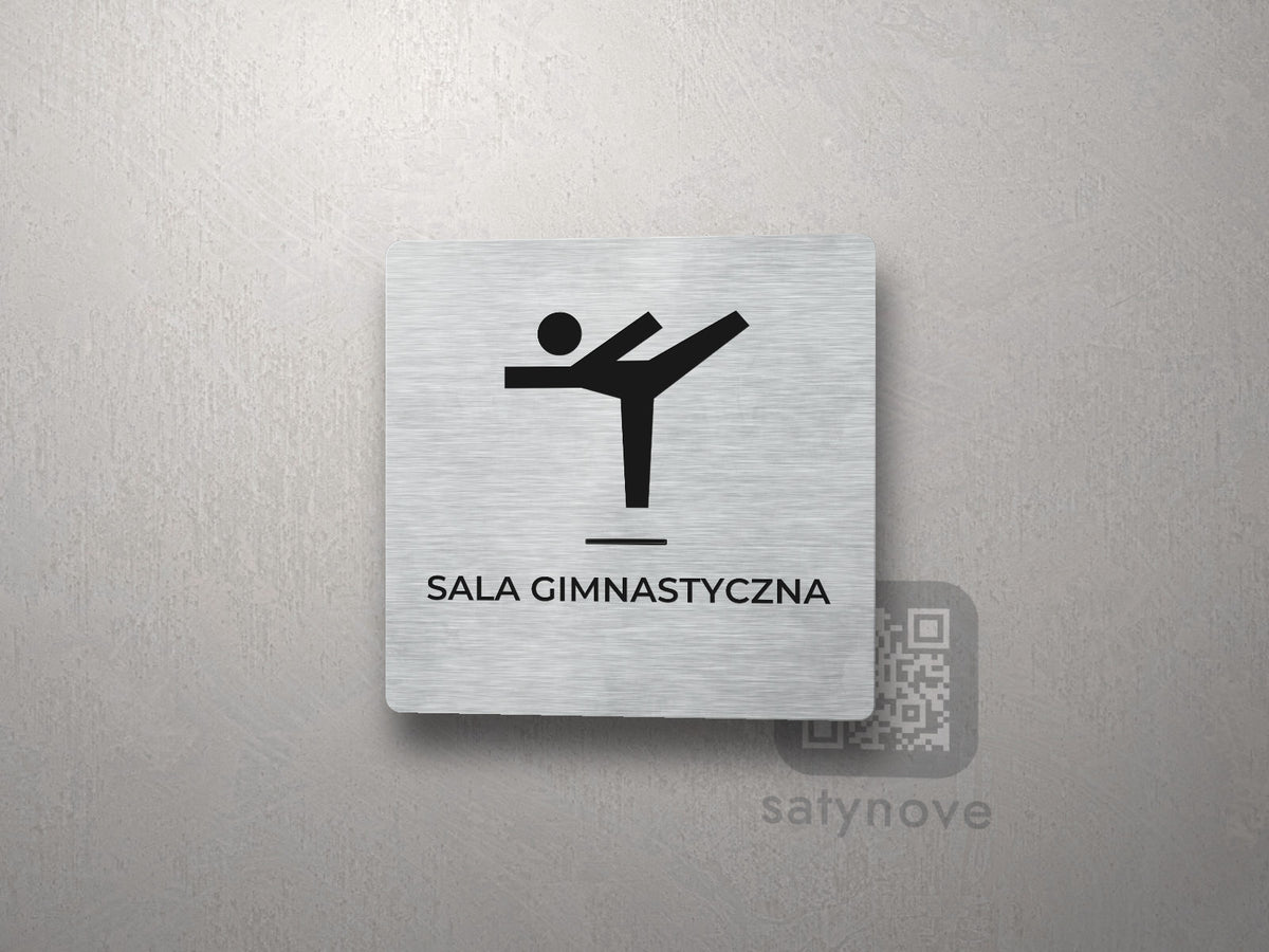 Kwadratowa tabliczka z piktogramem i napisem SALA GIMNASTYCZNA