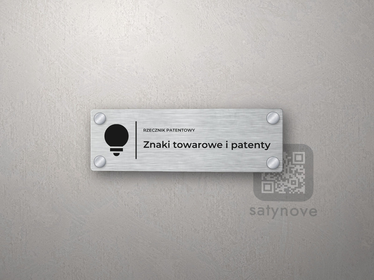 Tabliczka Rzecznik patentowy z symbolem