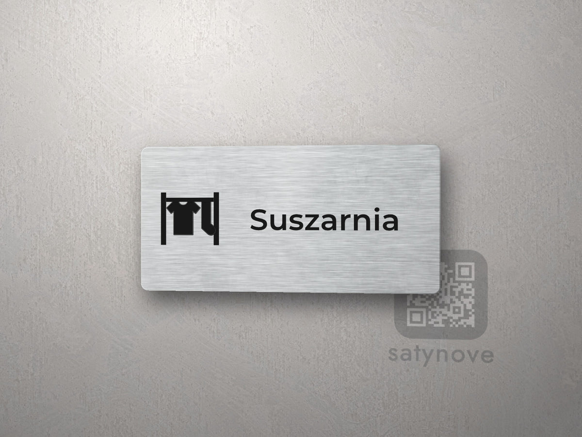 Srebrna tabliczka z piktogramem i napisem Suszarnia