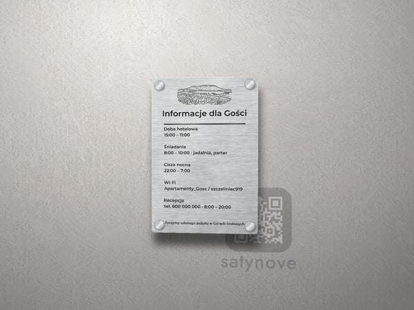 Srebrna tablica informacyjna dla gości z grafiką Gór Stołowych