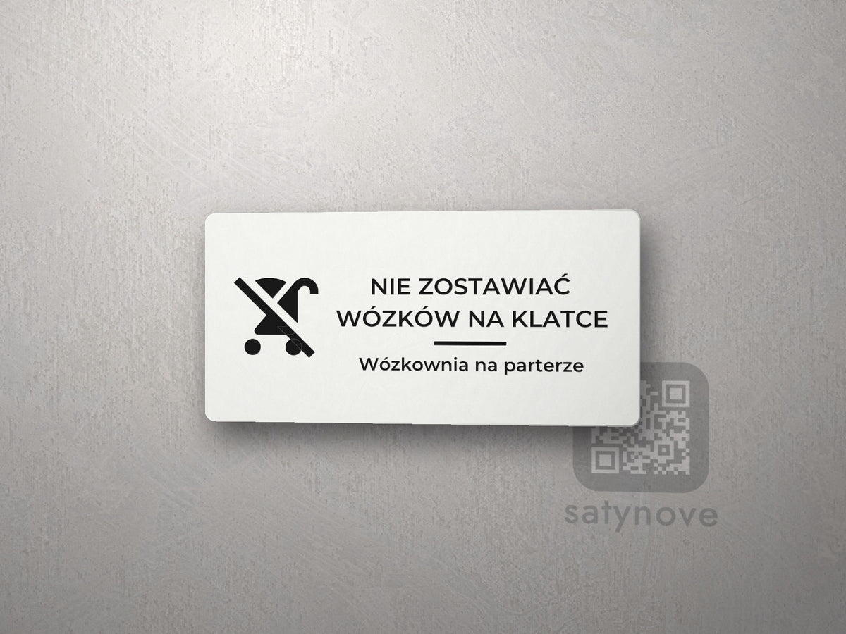 Tabliczka z piktogramem: NIE ZOSTAWIAĆ WÓZKÓW NA KLATCE, Wózkownia na parterze