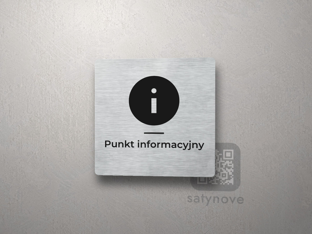 Srebrna kwadratowa tabliczka z symbolem informacji nad napisem „Punkt informacyjny”
