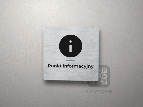 Srebrna kwadratowa tabliczka z symbolem informacji nad napisem „Punkt informacyjny”